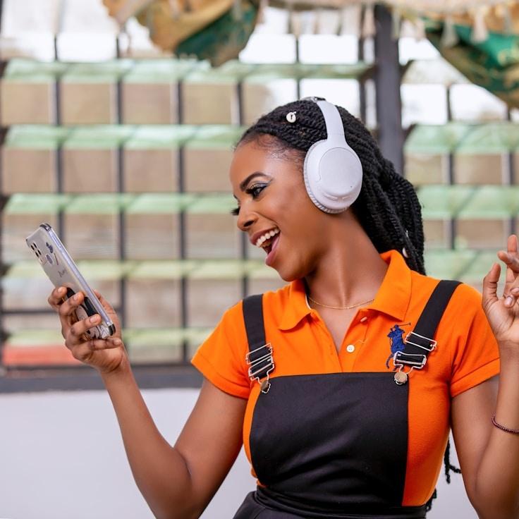 Kaveri Mehta, Lead Design Curator at Kernel Grove Grain, reviewing corporate floral arrangements
